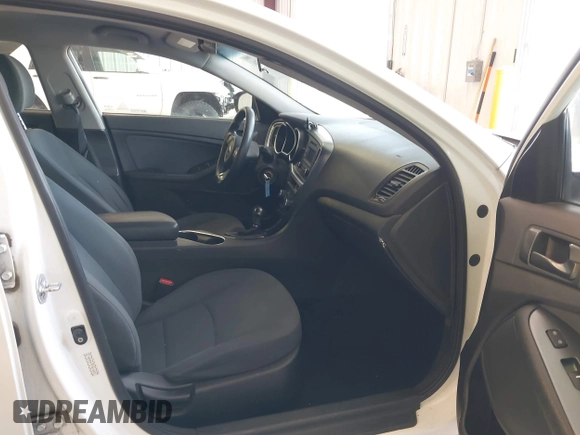 2015 Kia Optima LX with VIN KNAGM4A79F5616665, listed as a IAAI auction lot 42121526 with 153,022 mi miles. Bid and sale history available at carsss.com. Image 5.