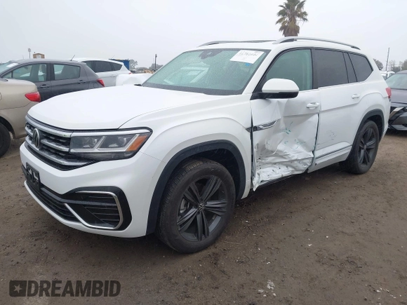 2022 Volkswagen Atlas 3.6L V6 SEL R-Line with VIN 1V2AR2CA5NC548221, listed as a IAAI auction lot 41781601 with 36,922 mi miles. Bid and sale history available at carsss.com. Image 2.