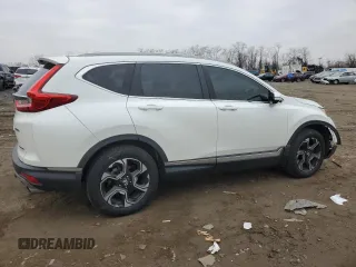 2018 Honda CR-V Touring with VIN 2HKRW2H98JH695059, listed as a Copart auction lot 86452054 with 114,437 mi miles and Salvage Title. Bid and sale history available at DreamBid. Image 3.