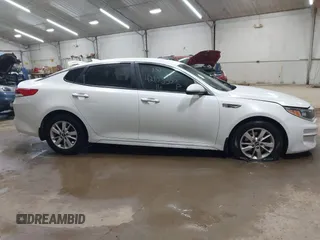2016 Kia Optima LX with VIN 5XXGT4L39GG048740, listed as a IAAI auction lot 42103300 with 111,574 mi miles and . Bid and sale history available at DreamBid. Image 13.
