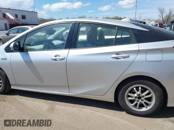 2017 Toyota Prius Plus z VIN JTDKARFP1H3001327, wystawiony jako IAAI lot #41895059 z przebiegiem 91 821 mil mil oraz . Historia ofert i sprzedaży dostępna na DreamBid. Obrazek 13.