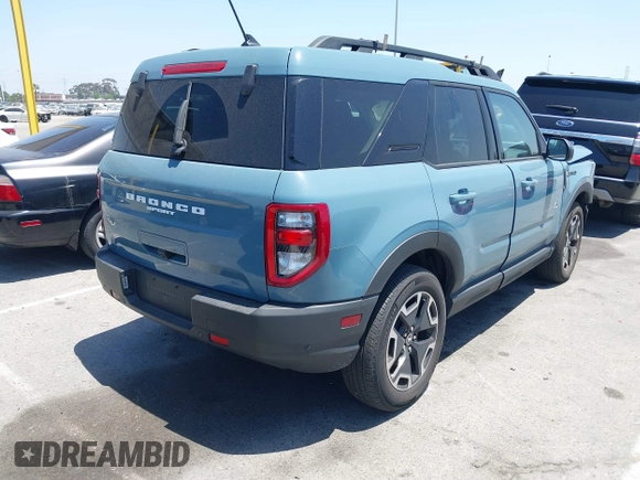 2023 Ford Bronco Sport Outer Banks z VIN 3FMCR9C62PRD61985, wystawiony jako IAAI lot #42304591 z przebiegiem 18 879 mil mil oraz . Historia ofert i sprzedaży dostępna na DreamBid. Obrazek 4.