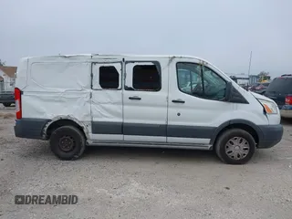 2016 Ford Transit Cargo z VIN 1FTYR1ZM3GKB36643, wystawiony jako IAAI lot #41127604 z przebiegiem 182 845 mil mil oraz . Historia ofert i sprzedaży dostępna na DreamBid. Obrazek 13.