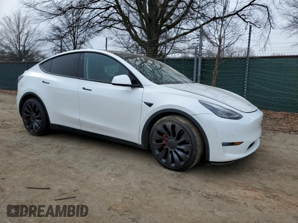 2022 Tesla Model Y Performance with VIN 7SAYGDEF7NF311990, listed as a Copart auction lot 43705395 with 25,651 mi miles and Salvage Title. Bid and sale history available at DreamBid. Image 4.