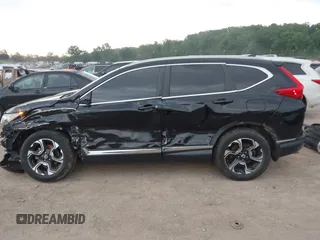2017 Honda CR-V Touring with VIN 2HKRW2H96HH672017, listed as a IAAI auction lot 42151118 with 144,527 mi miles and . Bid and sale history available at carsss.com. Image 15.