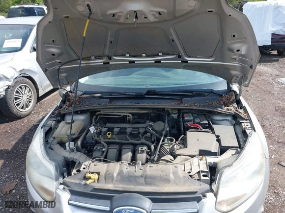 2012 Ford Focus SE with VIN 1FAHP3F22CL115877, listed as a IAAI auction lot 42031223 with 138,743 mi miles. Bid and sale history available at carsss.com. Image 10.