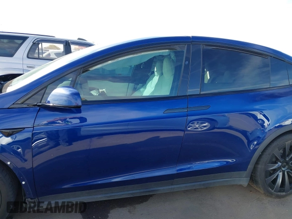 2022 Tesla Model X with VIN 7SAXCDE58NF341112, listed as a IAAI auction lot 41632491 with Not Provided miles and . Bid and sale history available at DreamBid. Image 14.
