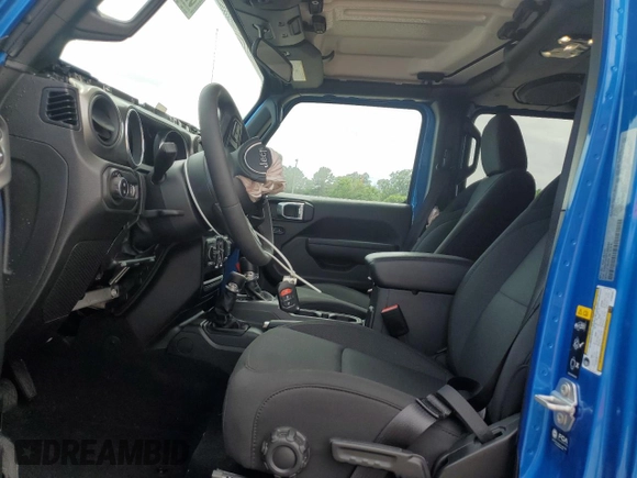 2023 Jeep Gladiator Sport S with VIN 1C6HJTAG3PL593284, listed as a Copart auction lot 57292935 with Not provided miles and Salvage title. Bid and sale history available at DreamBid. Image 7.