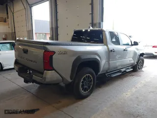 2024 Toyota Tacoma 4WD SR5 with VIN 3TMLB5JN4RM071338, listed as a IAAI auction lot 41742236 with 9,367 mi miles. Bid and sale history available at carsss.com. Image 4.