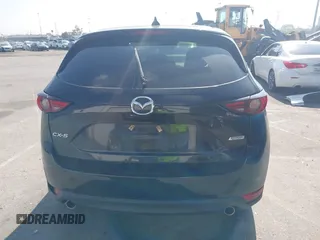 2019 Mazda CX-5 Grand Touring with VIN JM3KFADMXK1547727, listed as a IAAI auction lot 42138071 with Not provided miles and . Bid and sale history available at DreamBid. Image 16.