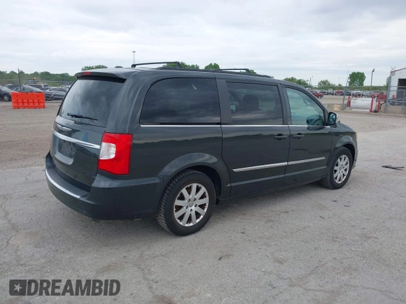 2012 Chrysler Town & Country Touring L with VIN 2C4RC1CG1CR163442, listed as a IAAI auction lot 42207924 with 197,111 mi miles and . Bid and sale history available at DreamBid. Image 4.