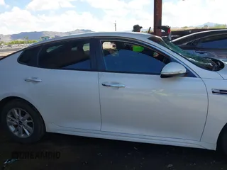 2017 Kia Optima LX with VIN 5XXGT4L37HG176394, listed as a IAAI auction lot 42397417 with 82,310 mi miles and . Bid and sale history available at DreamBid. Image 13.