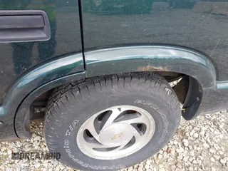 2003 Chevrolet Blazer LS z VIN 1GNDT13X93K177170, wystawiony jako IAAI lot #41839837 z przebiegiem 148 555 mil mil oraz . Historia ofert i sprzedaży dostępna na DreamBid. Obrazek 14.