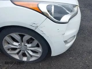 2013 Hyundai Veloster w/Gray Int с VIN KMHTC6AD5DU089115, выставлен на аукционе IAAI как лот 42498078 с пробегом 119 144 миль миль и . История ставок и продаж доступна на DreamBid. Изображение 12.