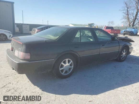 1996 Cadillac Seville Touring STS z VIN 1G6KY5299TU801228, wystawiony jako Copart lot #47304045 z przebiegiem Nie podano mil oraz Szkoda całkowita • Salvage title. Historia ofert i sprzedaży dostępna na DreamBid. Obrazek 3.