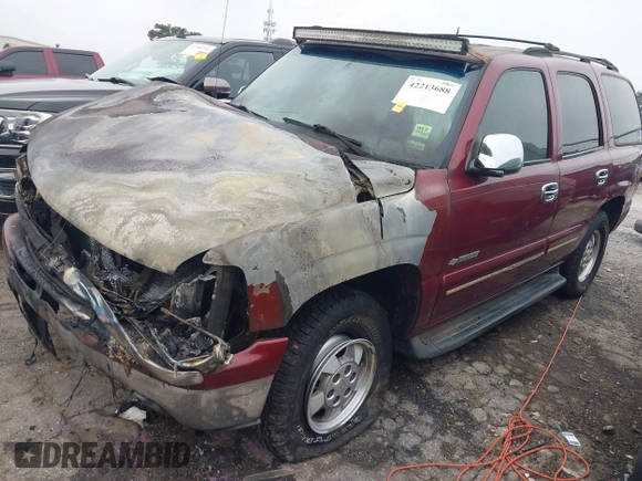 2003 Chevrolet Tahoe LS z VIN 1GNEC13Z73J164865, wystawiony jako IAAI lot #42213688 z przebiegiem Nie podano mil oraz . Historia ofert i sprzedaży dostępna na DreamBid. Obrazek 2.