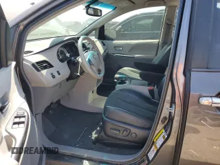 2012 Toyota Sienna SE with VIN 5TDXK3DC0CS239743, listed as a Copart auction lot 49504855 with 113,160 mi miles and Salvage title. Bid and sale history available at DreamBid. Image 7.