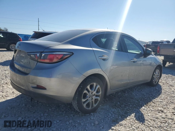 2016 Scion iA z VIN 3MYDLBZV4GY144476, wystawiony jako Copart lot #47667595 z przebiegiem 55 060 mil mil oraz Szkoda całkowita • Salvage title. Historia ofert i sprzedaży dostępna na DreamBid. Obrazek 3.
