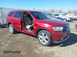 2015 Dodge Durango Limited with VIN 1C4RDJDG5FC688626, listed as a IAAI auction lot 41734454 with 156,869 mi miles. Bid and sale history available at carsss.com. Image 1.
