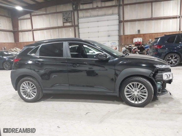 2019 Hyundai Kona SEL with VIN KM8K6CAA4KU382976, listed as a IAAI auction lot 41820749 with 61,619 mi miles. Bid and sale history available at carsss.com. Image 13.