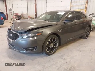 2015 Ford Taurus SHO with VIN 1FAHP2KT2FG148691, listed as a IAAI auction lot 42033867 with 94,840 mi miles and . Bid and sale history available at DreamBid. Image 2.