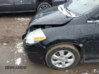 2009 Nissan Versa 1.8 SL with VIN 3N1BC13E49L427102, listed as a IAAI auction lot 41553357 with 133,300 mi miles. Bid and sale history available at carsss.com. Image 6.