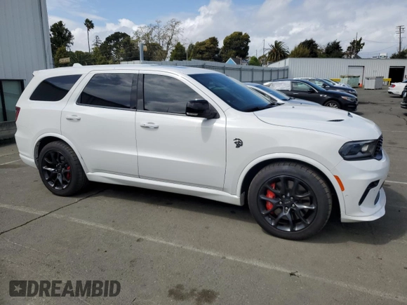 2021 Dodge Durango SRT Hellcat with VIN 1C4SDJH94MC689468, listed as a Copart auction lot 50309725 with 24,420 mi miles and Salvage Title. Bid and sale history available at DreamBid. Image 4.