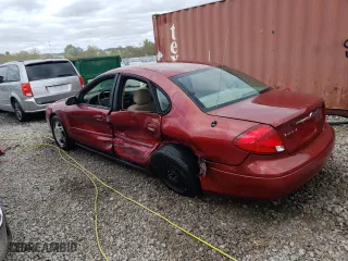 2002 Ford Taurus LX with VIN 1FAFP52U82A270129, listed as a Copart auction lot 69884974 with 79,590 mi miles and Salvage Title. Bid and sale history available at carsss.com. Image 2.