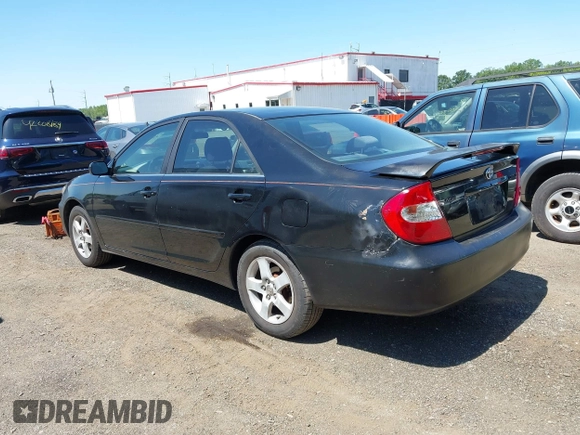 2002 Toyota Camry LE z VIN JTDBE32K020095947, wystawiony jako IAAI lot #42364984 z przebiegiem 198 756 mil mil oraz . Historia ofert i sprzedaży dostępna na DreamBid. Obrazek 3.