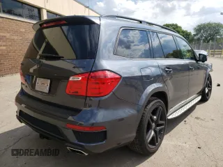 2015 Mercedes-Benz GL-Class GL 550 with VIN 4JGDF7DE7FA561521, listed as a Copart auction lot 56681512 with 67,329 mi miles. Bid and sale history available at carsss.com. Image 4.