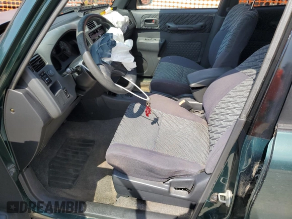 2000 Toyota RAV4 с VIN JT3HP10V3Y7165886, выставлен на аукционе Copart как лот 55946715 с пробегом 136 518 миль миль и Списание • Salvage title. История ставок и продаж доступна на DreamBid. Изображение 7.