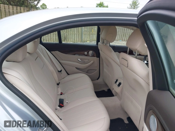 2018 Mercedes-Benz E 300 with VIN WDDZF4KB3JA385504, listed as a IAAI auction lot 42340289 with 15,336 mi miles and . Bid and sale history available at DreamBid. Image 8.