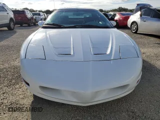 1997 Pontiac Firebird Firebird z VIN 2G2FS22K5V2232134, wystawiony jako Copart lot #74087964 z przebiegiem Nie podano mil oraz Szkody całkowita. Historia ofert i sprzedaży dostępna na DreamBid. Obrazek 5.