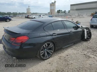 2016 BMW M6 z VIN WBS6E9C53GGF92689, wystawiony jako Copart lot #60226324 z przebiegiem Nie podano mil oraz Szkody całkowita. Historia ofert i sprzedaży dostępna na DreamBid. Obrazek 3.
