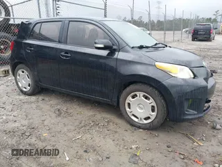 2010 Scion xD with VIN JTKKU4B45AJ058839, listed as a IAAI auction lot 41708936 with 214,685 mi miles. Bid and sale history available at carsss.com. Image 1.