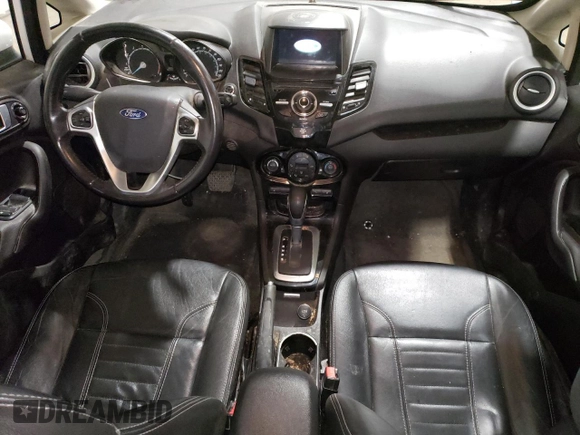 2016 Ford Fiesta Titanium z VIN 3FADP4CJ0GM167738, wystawiony jako Copart lot #57875245 z przebiegiem 159 230 mil mil oraz Czysty tytuł • Clean title. Historia ofert i sprzedaży dostępna na DreamBid. Obrazek 8.