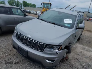2018 Jeep Grand Cherokee Laredo E with VIN 1C4RJFAG5JC377197, listed as a IAAI auction lot 42432131 with 58,981 mi miles and . Bid and sale history available at DreamBid. Image 18.