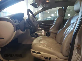 2003 Chrysler Concorde Limited z VIN 2C3HD56GX3H580919, wystawiony jako Copart lot #70894204 z przebiegiem 138 277 mil mil oraz Szkody całkowita. Historia ofert i sprzedaży dostępna na DreamBid. Obrazek 7.