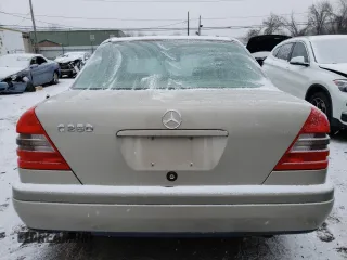 1994 Mercedes-Benz C with VIN WDBHA28E6RF015428, listed as a Copart auction lot 85866784 with Not Provided miles and Salvage Title. Bid and sale history available at carsss.com. Image 6.