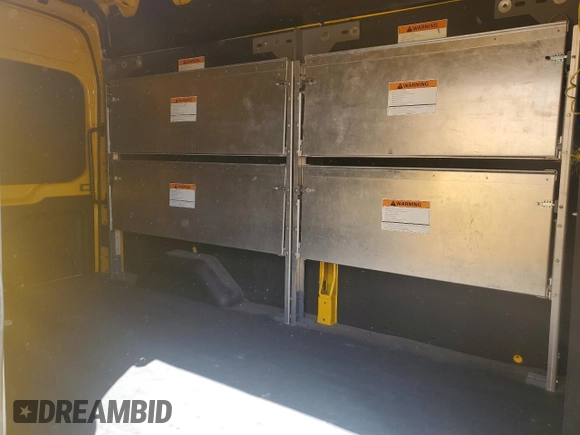 2023 Ford Transit Cargo with VIN 1FTBR1X87PKA73817, listed as a Copart auction lot 60380665 with 40,487 mi miles and Salvage title. Bid and sale history available at DreamBid. Image 11.