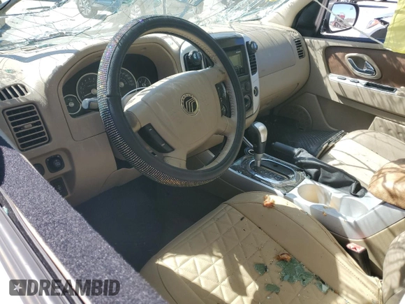 2005 Mercury Mariner Luxury z VIN 4M2CU56125DJ17538, wystawiony jako Copart lot #46948345 z przebiegiem 158 277 mil mil oraz Szkoda całkowita • Salvage title. Historia ofert i sprzedaży dostępna na DreamBid. Obrazek 8.