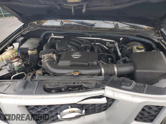 2011 Nissan Xterra S z VIN 5N1AN0NWXBC504569, wystawiony jako Copart lot #57297355 z przebiegiem 151 680 mil mil oraz Szkoda całkowita • Salvage title. Historia ofert i sprzedaży dostępna na DreamBid. Obrazek 12.