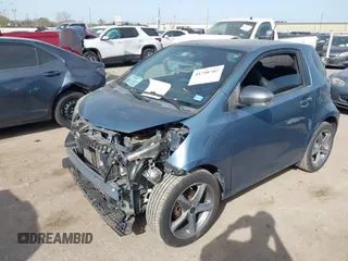 2012 Scion iQ with VIN JTNJJXB09CJ019082, listed as a IAAI auction lot 41798707 with 120,628 mi miles. Bid and sale history available at carsss.com. Image 18.
