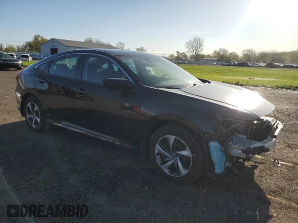 2019 Honda Civic LX with VIN 19XFC2F60KE025306, listed as a Copart auction lot 53949305 with 50,671 mi miles and Salvage Title. Bid and sale history available at DreamBid. Image 4.