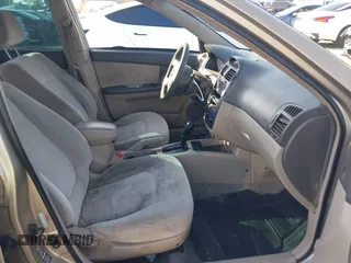 2004 Kia Spectra LX with VIN KNAFE122145013930, listed as a IAAI auction lot 41627031 with 93,565 mi miles. Bid and sale history available at carsss.com. Image 5.