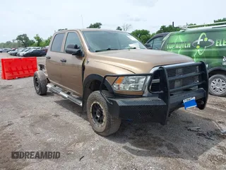 2012 Ram 2500 ST z VIN 3C6UD5CLXCG272362, wystawiony jako IAAI lot #42216175 z przebiegiem 217 984 mil mil oraz . Historia ofert i sprzedaży dostępna na DreamBid. Obrazek 1.