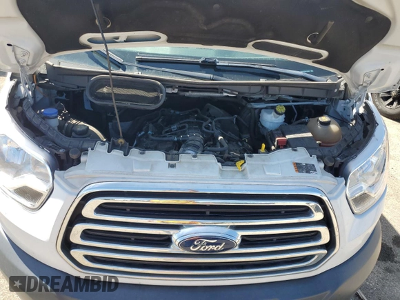 2018 Ford Transit Passenger XL z VIN 1FBZX2YG9JKA69909, wystawiony jako Copart lot #69885874 z przebiegiem 102 175 mil mil oraz Szkoda całkowita • Salvage title. Historia ofert i sprzedaży dostępna na DreamBid. Obrazek 12.