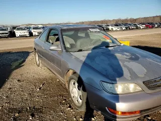1997 Acura CL z VIN 19UYA1256VL005063, wystawiony jako Copart lot #83031204 z przebiegiem 120 250 mil mil oraz Szkoda całkowita • Salvage title. Historia ofert i sprzedaży dostępna na DreamBid. Obrazek 11.