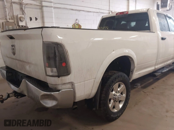 2015 Ram 2500 SLT z VIN 3C6TR5JT2FG645527, wystawiony jako IAAI lot #41711532 z przebiegiem 178 185 mil mil oraz . Historia ofert i sprzedaży dostępna na DreamBid. Obrazek 4.