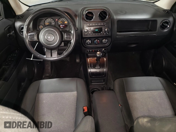 2014 Jeep Patriot Latitude with VIN 1C4NJPFB1ED767103, listed as a Copart auction lot 51844535 with 158,480 mi miles and Salvage title. Bid and sale history available at DreamBid. Image 8.